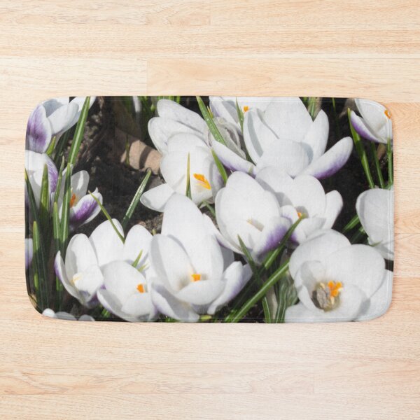Item preview, pattern of white flowers crocuses and green leaves on a dark background designed and sold by nataliavavilina.