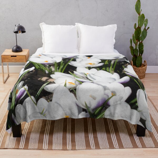Item preview, pattern of white flowers crocuses and green leaves on a dark background designed and sold by nataliavavilina.