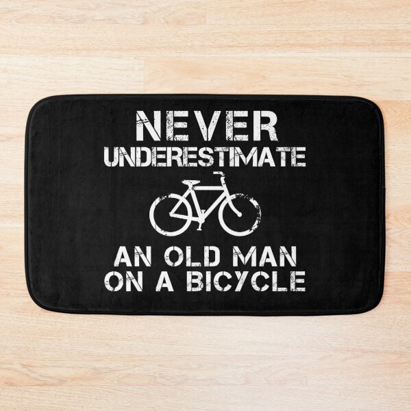 Item preview, Never Underestimate an Old Man on A bicycle designed and sold by cannevas.