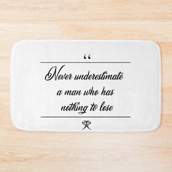 Item preview, Never underestimate a man citation t-shirt designed and sold by KIKOOSTORE.
