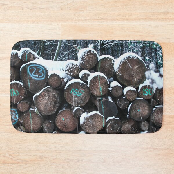 Item preview, Tree trunks stacked by snow covered in winter forest designed and sold by AOCreativeProd.