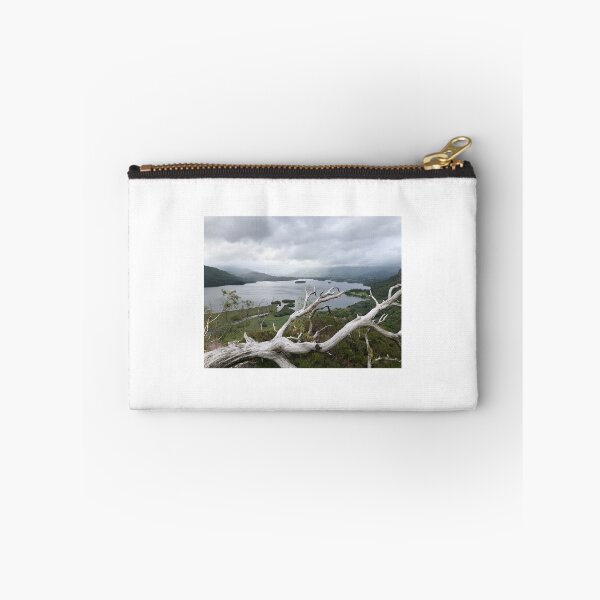 Item preview, Keswick Lake a view from Friar’s Crag under Storm sky and framed by a fallen Birch  designed and sold by HiddenGemsPics.