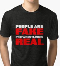 People are fake pro wrestling is real Tri-blend T-Shirt