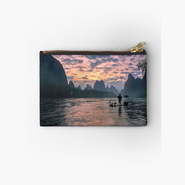 Item preview, Man rowing Boat Between The Mountains designed and sold by JTS STORE.