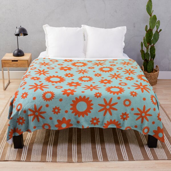 Item preview, Patrón de flor naranja vibrante sobre fondo azul. designed and sold by IslandDrip.