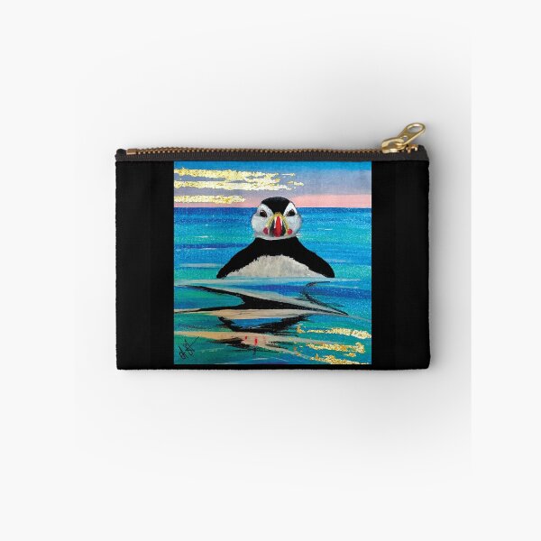 Item preview, puffin swimming with gold leaf detailing designed and sold by Clare Symington.