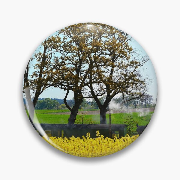 Item preview, Steam train passing a field of yellow canola blossoms designed and sold by Michael Brewer.