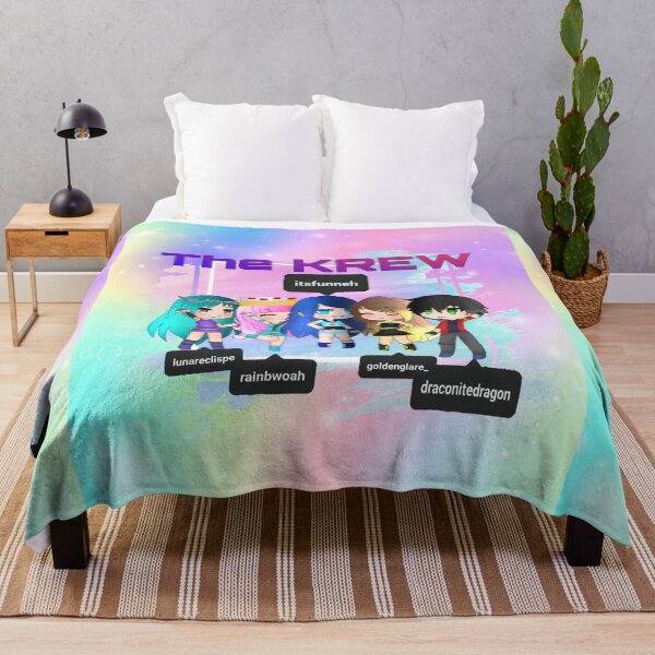 The krew Throw Blanket