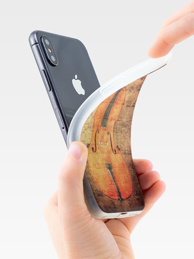 Funda de iPhone for Sale con la obra «Violonchelo clásico de madera con  partituras con aspecto vintage» de mcornelius