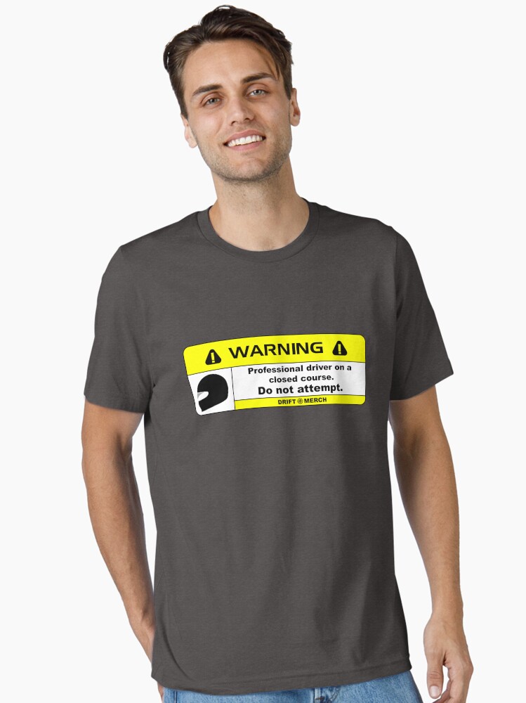 Thumbnail 1 of 7, Essential T-Shirt, Professional Driver on a Closed Course Funny Warning Disclaimer designed and sold by driftmerch.
