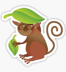 A TARSIER wild animal of the Phillipines hiding under leaves Sticker