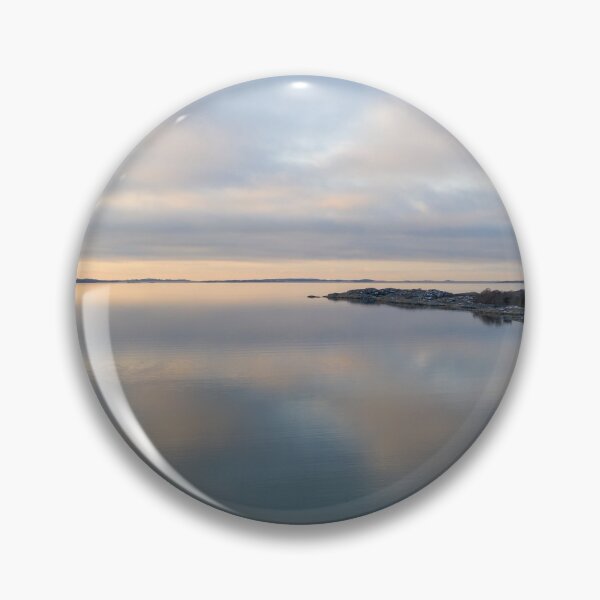 Item preview, Pale evening in winter at sea drone photo designed and sold by EngineerGoC.