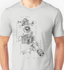 Nikon camera diagram attributed to 'J.leGuernic, 1976'. Unisex T-Shirt