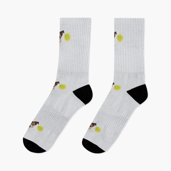 Item preview, Terrier chases the tennis ball in the snow designed and sold by Ingo Gerlach.