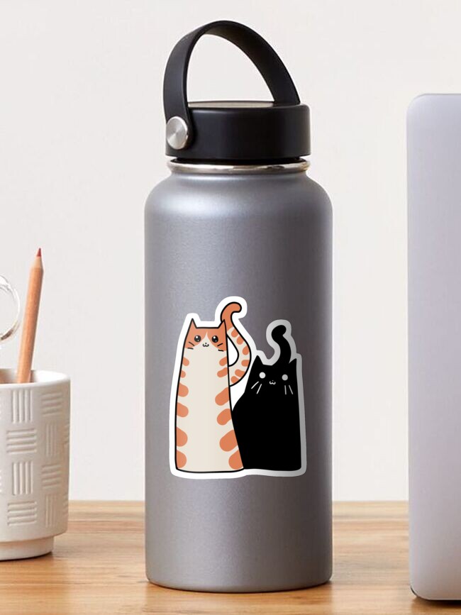 Thumbnail 1 of 3, Sticker, Tabby Cat and Black Cat designed and sold by SaradaBoru.