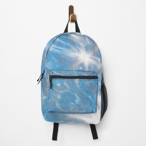 Item preview, blue water with sun glare on it close-up designed and sold by nataliavavilina.