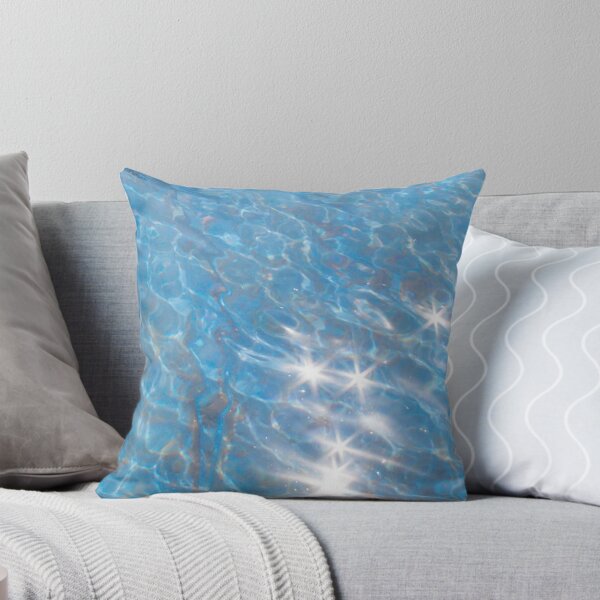 Item preview, blue water with sun glare on it close-up designed and sold by nataliavavilina.