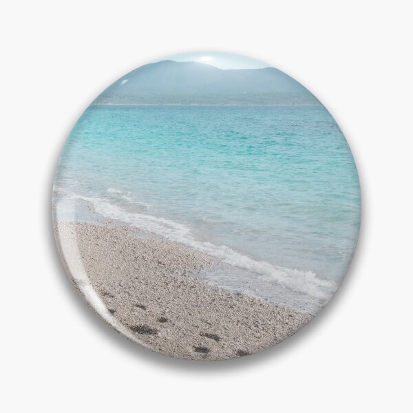 Item preview, White sandy beach with blue sea, mountains in the back designed and sold by Melissa Peltenburg.