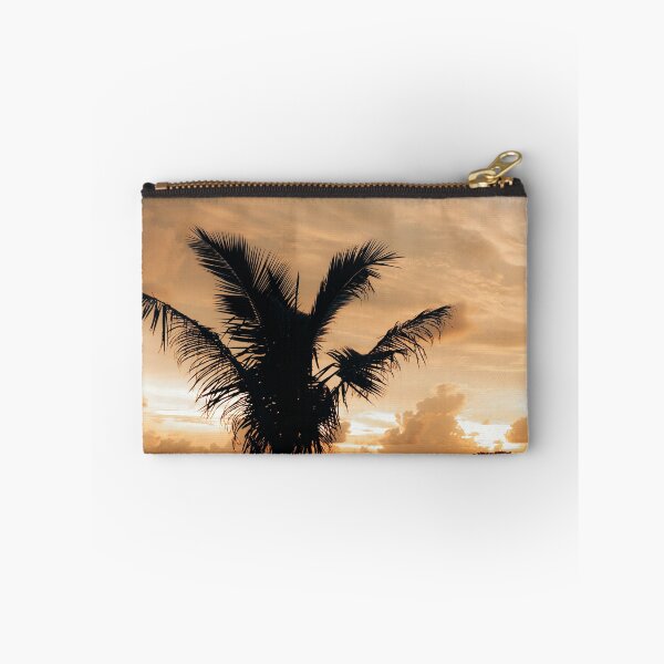 Item preview, Warm cloudy sunset with palm tree silhouette designed and sold by Melissa Peltenburg.