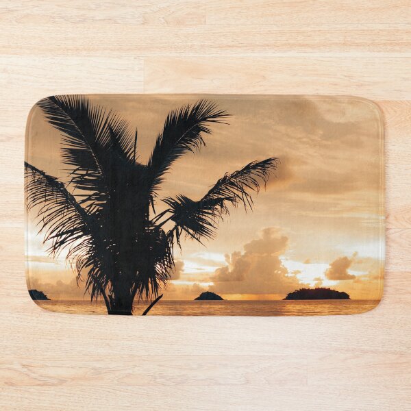 Item preview, Warm cloudy sunset with palm tree silhouette designed and sold by Melissa Peltenburg.