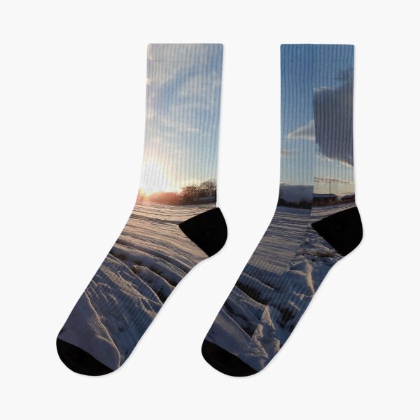 Item preview, A snowy sunset, tire tracks in the snow designed and sold by Stephanie Skeem.