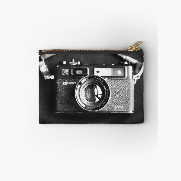 Item preview, Old Yashika film Camera in Black and white designed and sold by Madeleine Cardozo.
