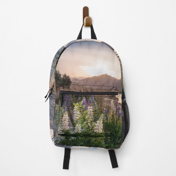 Item preview, Beautiful sunset light at Lake Te Anau with flowers in foreground, New Zealand designed and sold by Danielasphotos.