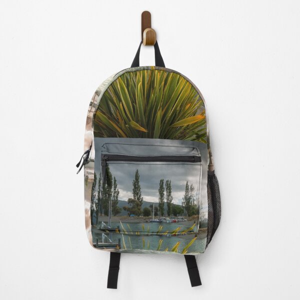 Item preview, Scenic Landscape with the sun reflected in the water at Te Anau Boating Club designed and sold by Danielasphotos.