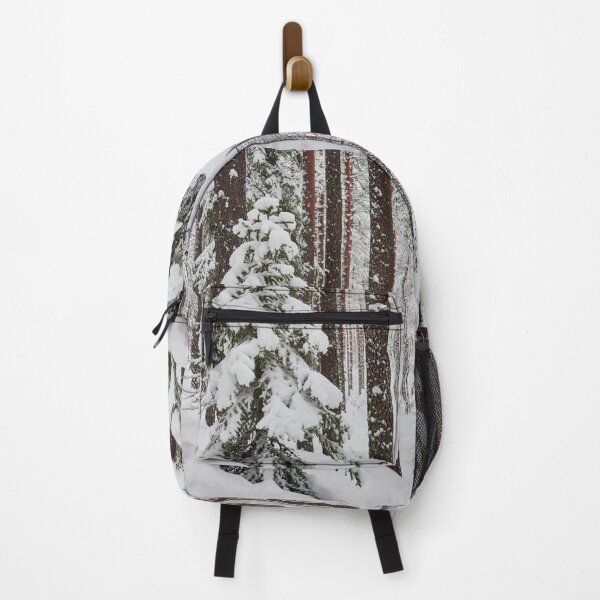 Item preview, Green spruce and red pines covered with white snow designed and sold by Jouko Lehto Photography.