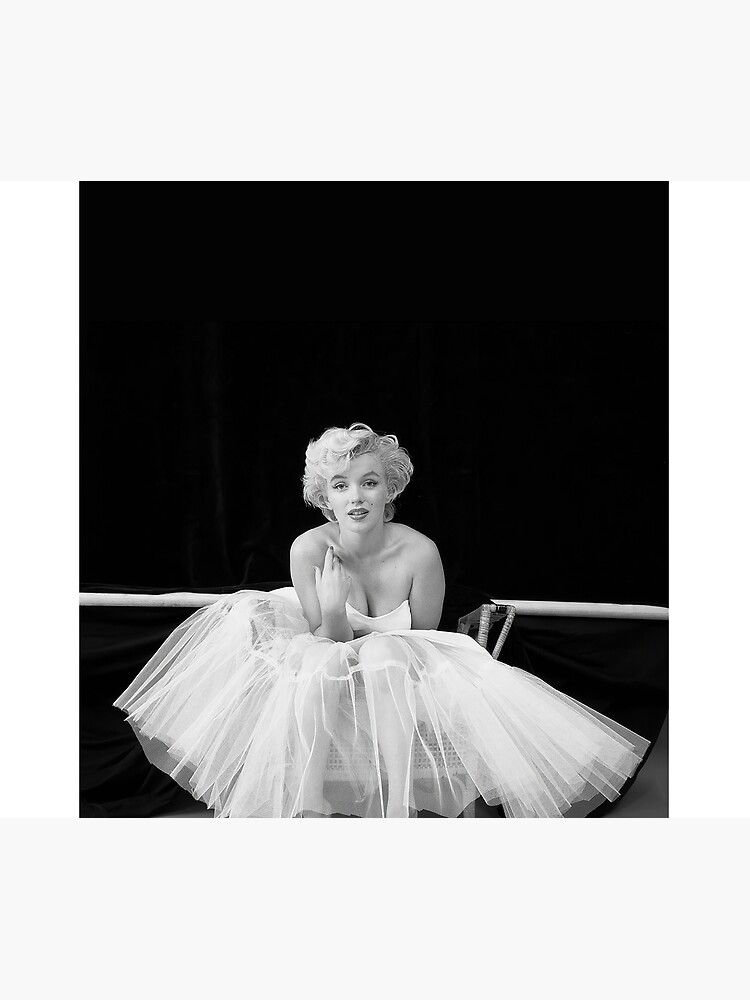 Marilyn Monroe looking like a goddess in the iconic white dress from 