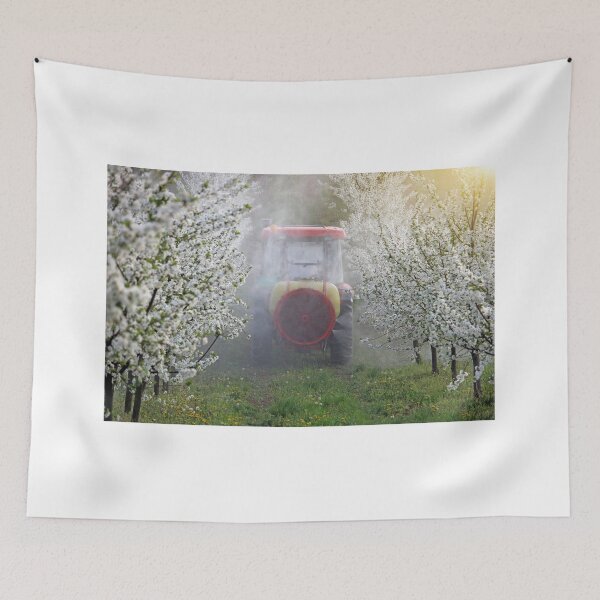 Item preview, tractor sprays insecticide in cherry orchard springtime designed and sold by goceris.