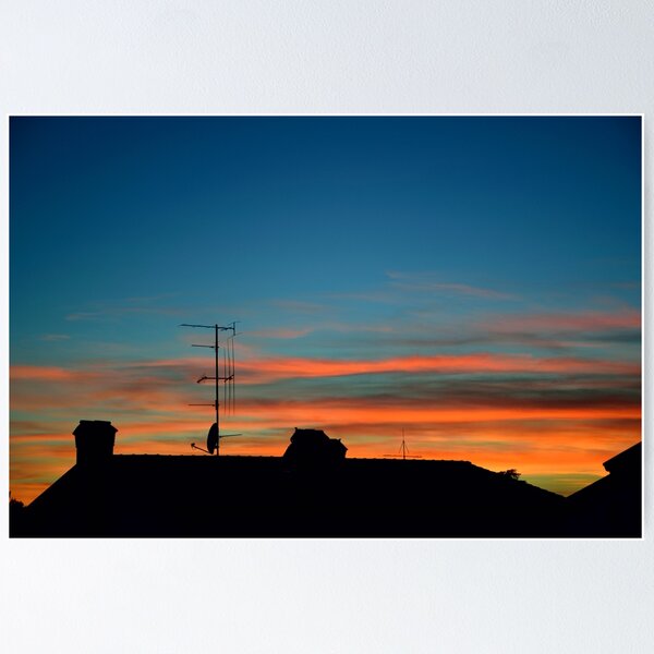 Item preview, Orange and blue sunset with roofline silhouette designed and sold by Anyarnia.