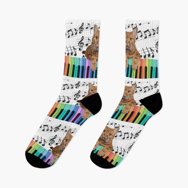 Item preview, Orange Tabby Cat Playing Rainbow Piano Keyboard Musical Notes designed and sold by BrokenUnicorn.
