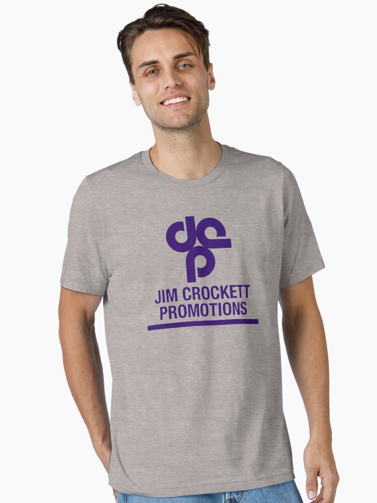Thumbnail 1 of 7, Essential T-Shirt, Jim Crockett Promotions Logo designed and sold by CDSmiles.