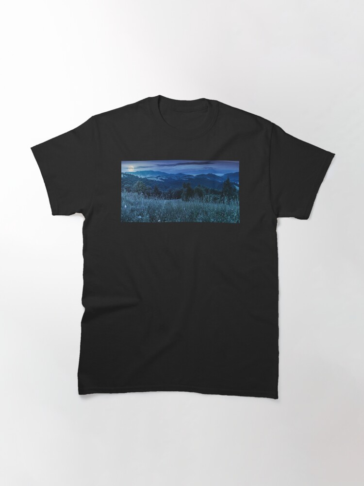 Thumbnail 3 of 7, Classic T-Shirt, panorama of a meadow in mountains at night designed and sold by mike-pellinni.