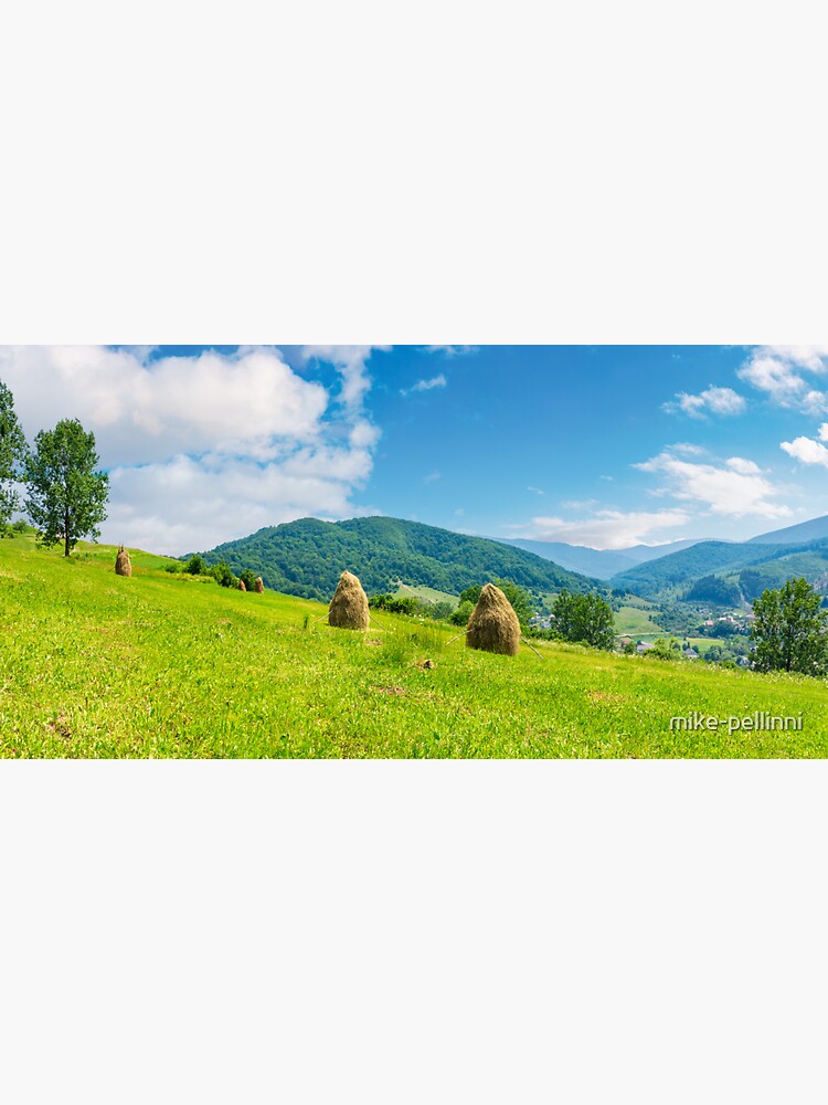 Thumbnail 3 of 3, Sticker, haystacks on a grassy hill in summer designed and sold by mike-pellinni.
