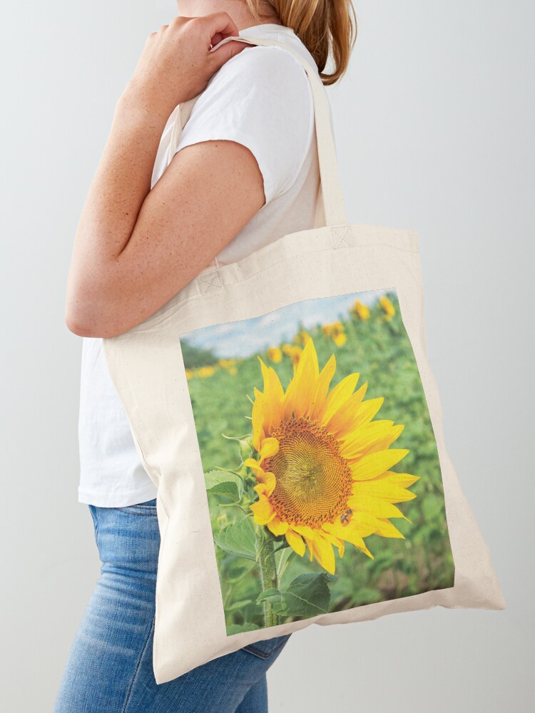 Thumbnail 1 of 5, Tote Bag, Ripe sunflower in the field designed and sold by mike-pellinni.