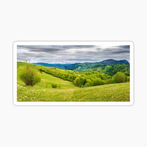 countryside in mountain on a cloudy day Sticker
