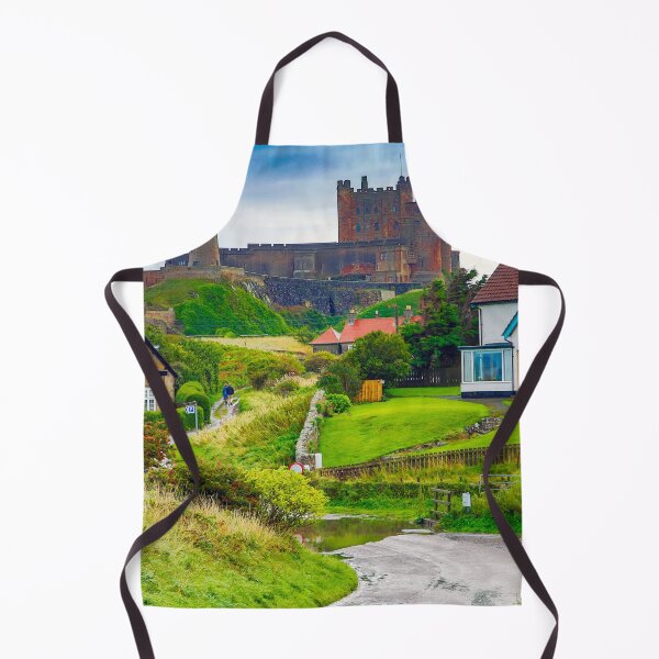 Item preview, View of Bamburgh village and castle, Northumberland, UK designed and sold by Itsgrimupnorth.