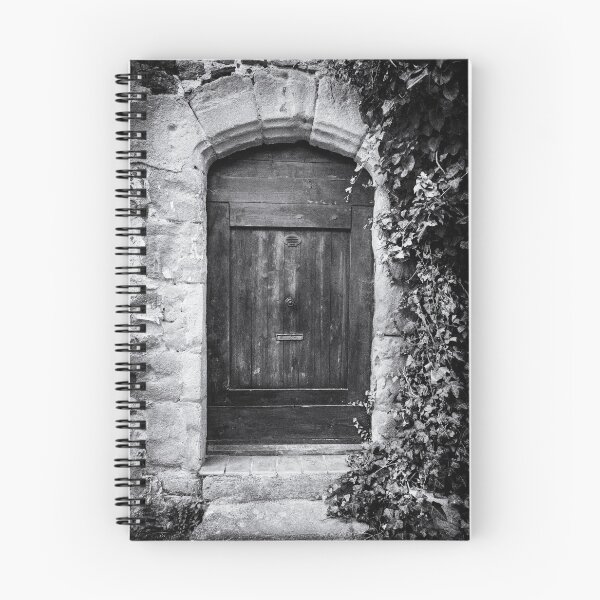 Item preview, Black and white photo of a secret mysterious old door overgrown with ivy in France designed and sold by Diana van Neck.