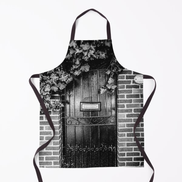 Item preview, Black and white photo of a secret mystery garden door in London designed and sold by Diana van Neck.
