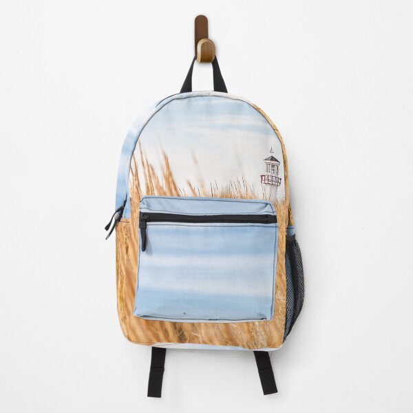 Item preview, Lighthouse visible above the dune grasses on a beach designed and sold by soupstock.