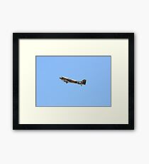 Two engines transport airplane Douglas DC-3 Dakota(C-47) the working hors of WWII in the air. Framed Print