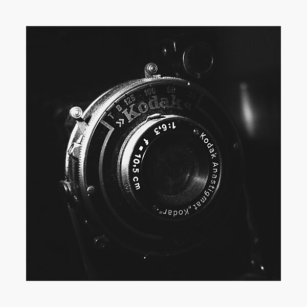 A black and white close-up photo of a vintage analog camera Photographic Print