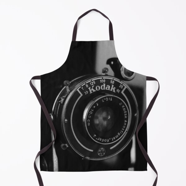 Item preview, Close-up photo of a retro analog camera in black and white designed and sold by Diana van Neck.