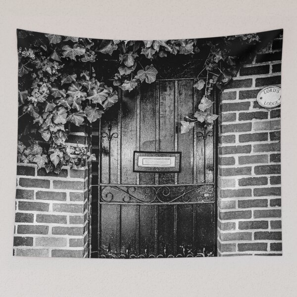 Item preview, Black and white photo of a secret mystery garden door in London designed and sold by Diana van Neck.