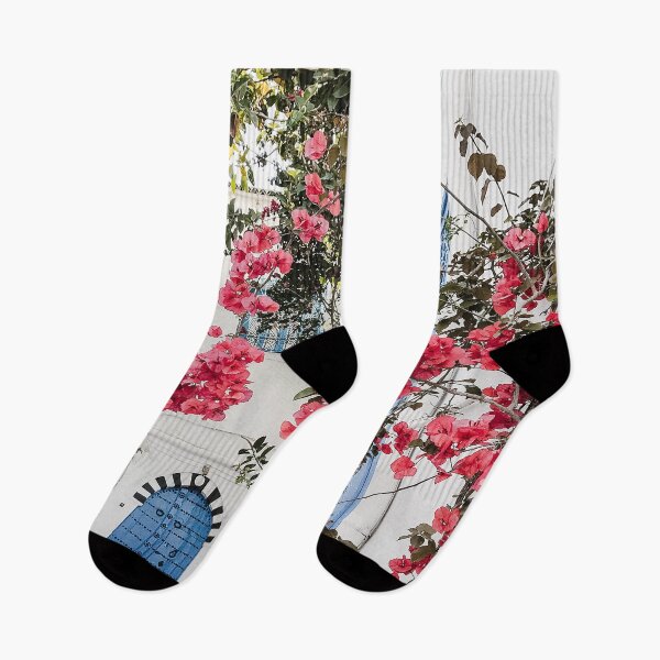 Item preview, Alley with blue door and pink blossom in Tunisia  designed and sold by Melissa Peltenburg.