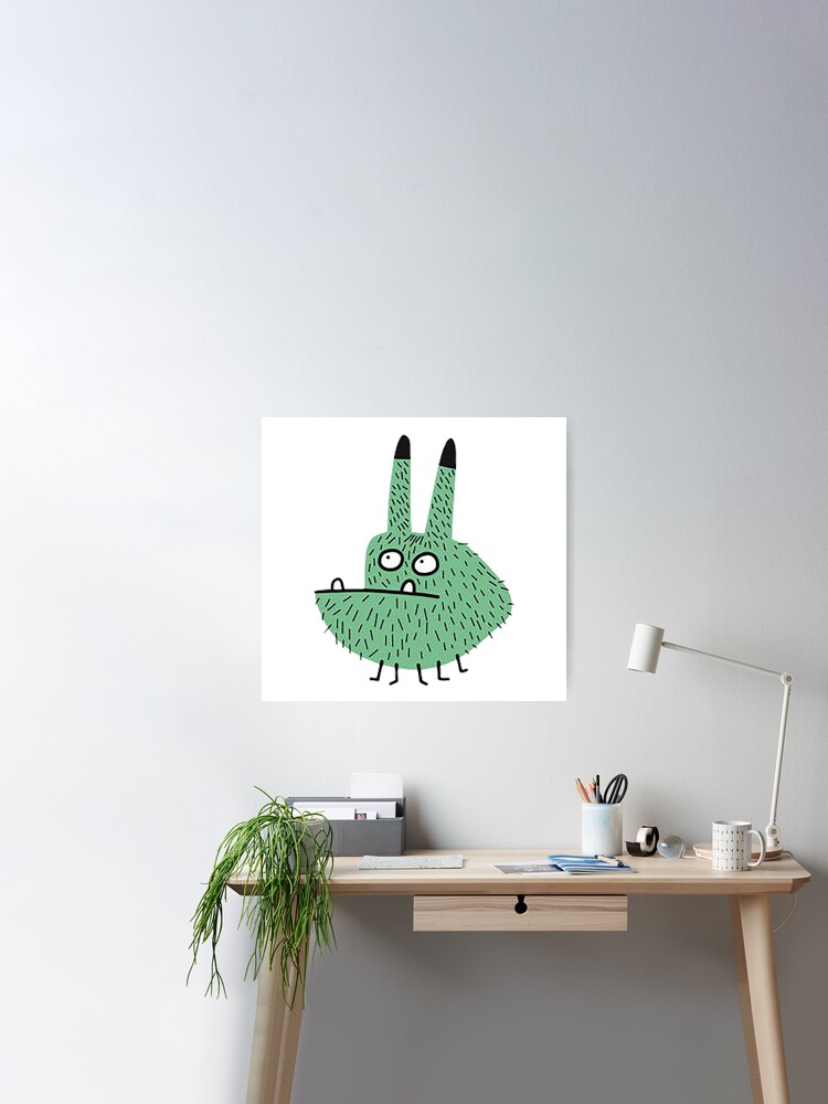 Fred the green Monster with tall bunny ears and an overbite