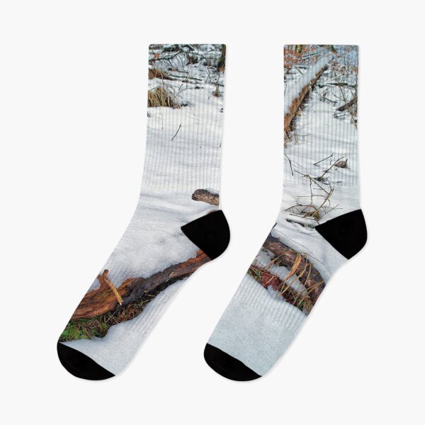 Item preview, Crossing tree trunks in the snow designed and sold by frankuffmann.