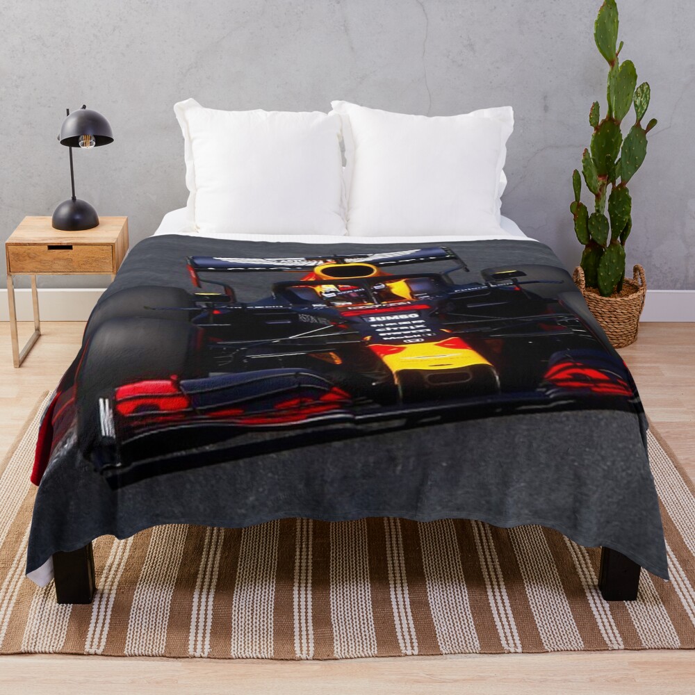 Max Verstappen racing his 2020 F1 car Throw Blanket